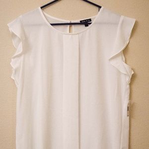 NEW White sleeveless/ruffle shirt